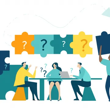 Die Illustration zeigt vier Personen, die gemeinsam an einer Lösung arbeiten, symbolisiert durch große Puzzleteile mit Fragezeichen. Eine Person hebt ein Puzzleteil hoch, während die anderen am Tisch diskutieren und ein Laptop nutzen.