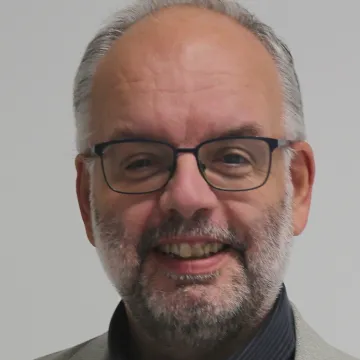 Das Bild zeigt das Portrait von Robert Lender, dem Interviewpartner